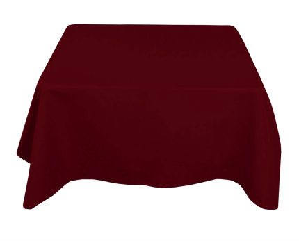 A burgundy tablecloth draped elegantly on a plain white background, showcasing its rich color and texture.