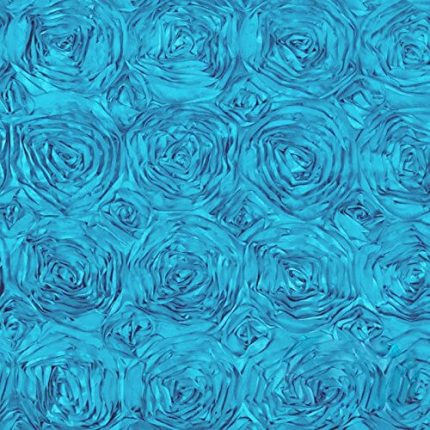 Beautiful turquoise rosette fabric – ideal for table overlays, event decor, and chair sashes.