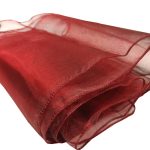 Rich burgundy tablecloth with a smooth, elegant finish, perfect for formal occasions.