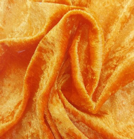 Vibrant orange fabric for bold and eye-catching table settings.