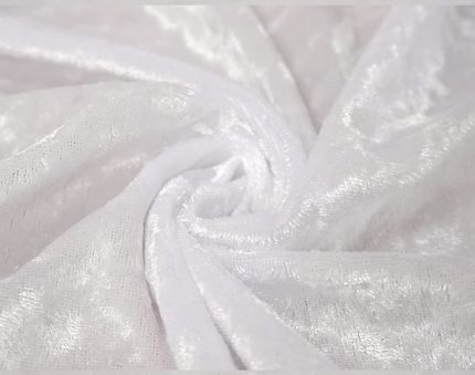 White crushed velvet tablecloth with a smooth, luxurious texture, ideal for sophisticated settings.