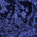 Rich navy blue crushed velvet fabric – perfect for luxurious table and chair decoration.