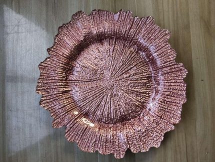 Chic rose gold charger plate, offering a modern and stylish touch to table decor.